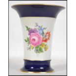 A modern Meissen cylindrical Vase, the flared rim with a gilt edge and decorated with mixed roses