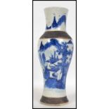 A late 19th century Chinese crackle glaze vase of baluster form.  The vase with  blue under glaze