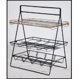 1950's retro drinks serving tray / magazine rack with carry handle.  This unusual item has a