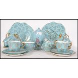 A collection of ceramics to include a Laurie & Co of London part tea service along with other