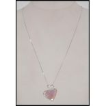A 9ct / 375 white gold necklace and mother of pearl & diamond heart pendant. Marked 9k / 375.