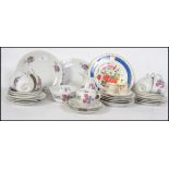A vintage early 20th century bone China chintzy floral tea service consisting of trio's, creamer,