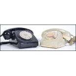 Two 20th century retro telephones one being a vintage BT model the other being a 1960s German