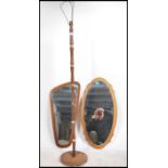 A pair of 1970's retro frameless teak wall mirrors of atomic form. Differing shaped with frameless