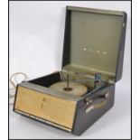 A vintage 20th century two tone portable four speed  record player by Bush