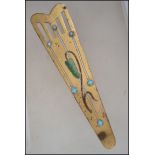 A beautiful early 20th century Art Nouveau ladies belt buckle adorned with turquoise and enamel leaf