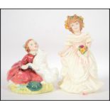 Two Royal Doulton figurines; 'Home Again' HN 2167