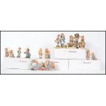 A collection of Studio Hummel figurines - Christma