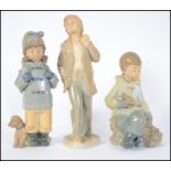 A group of three Nao 20th century ceramic figures