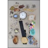 A wooden metalised wooden lined box of mixed jewellery.  Filled with items to include: a Swiss