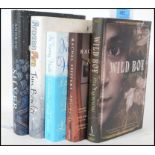 Signed novels: A collection of 5x signed / autographed novels comprising of: Wild Boy, 'In Tearing