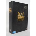 A boxed collectors Trilogy box set for The Godfather set, includes magazine and six sealed  video