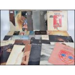 A collection of vinyl long play LP records. All re