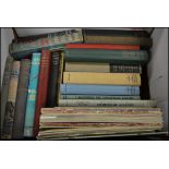 A collection of vintage books on aircraft and the