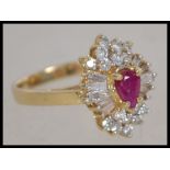 A stunning ladies 14ct yellow gold and ruby with d
