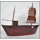 A 20th century tin plate model of a galleon ship w