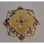 A Victorian 9ct gold ruby and dseed pearl ladies b