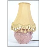 A 1930's lustre ceramic table lamp of bulbous form