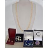 A group of jewellery to include a faux pearl neckl