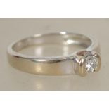 An 18ct white gold ladies single stone diamond rin