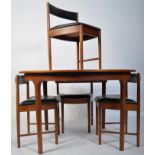 A 1970's McIntosh circular teak wood dining table and chairs in the manner of Frem Rojle. The