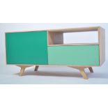 A fabulous Scandinavian inspired modernist Live Iconic Oskar low sideboard cabinet. Two tone colours