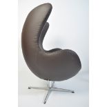 A fabulous Arne Jacobsen for Fritz Hansen style dark brown leather upholstered Egg chair - armchair.