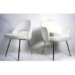 After Eero Saarinen, a near pair of white  faux leather and chrome upholstered ' executive ' side