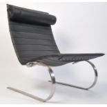After Poul Kjaerholm, a stunning black leather and polished steel PK20 armchair / chair. Raised on