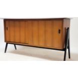 A believed Robin Day for Hille Furniture 1970's teak sideboard. The wide body comprising sliding