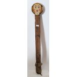 An early 20th century fairground attraction wooden hand painted ' shooting target ' face. The
