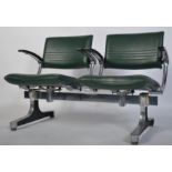 A 1970's retro polished steel twin seat barbers salon waiting chairs - armchairs having green