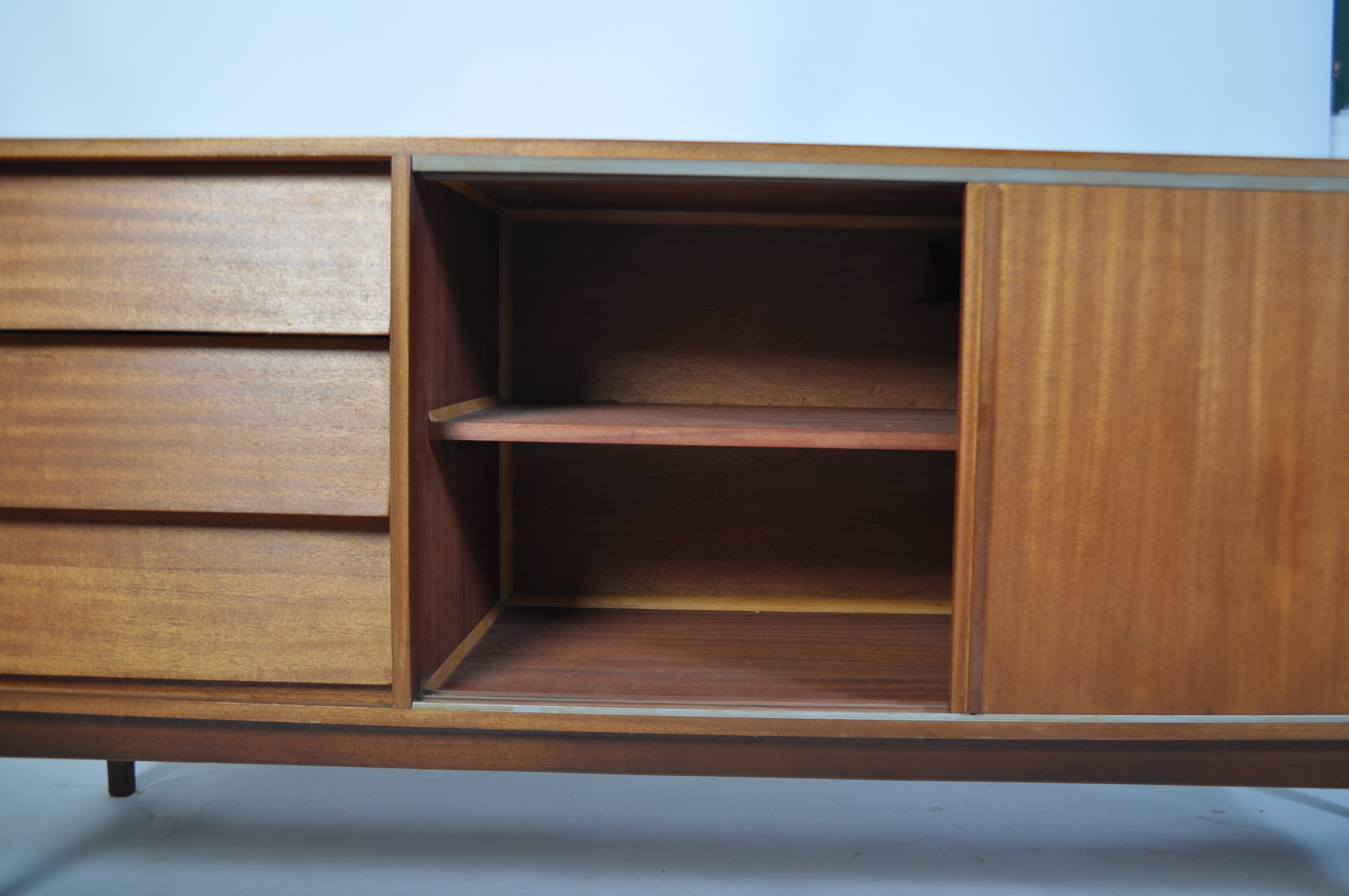 A retro mid century teak wood sideboard having a beehive angular facia comprising a series of - Image 5 of 5