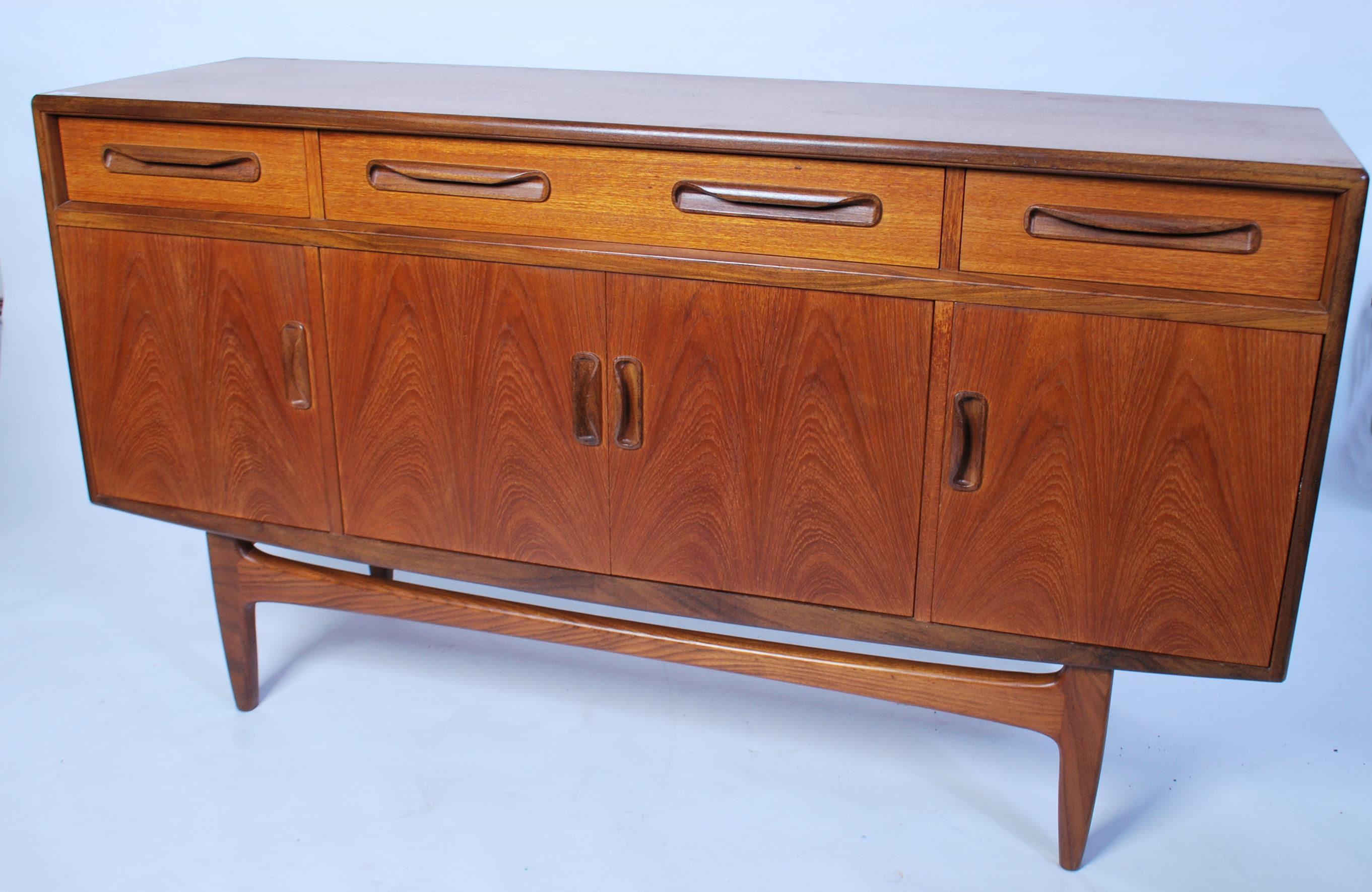 A 1970's retro G-Plan ' Fresco ' pattern teak wood sideboard being raised on tapered supports having - Image 2 of 6