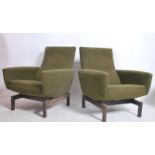 A stunning pair of mid century armchairs in the style of Pierre Guariche / Joseph Andre motte. The