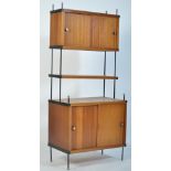 A 1970's Robex teak wood modular wall system cabinet having a series of teak shelves and cabinets of