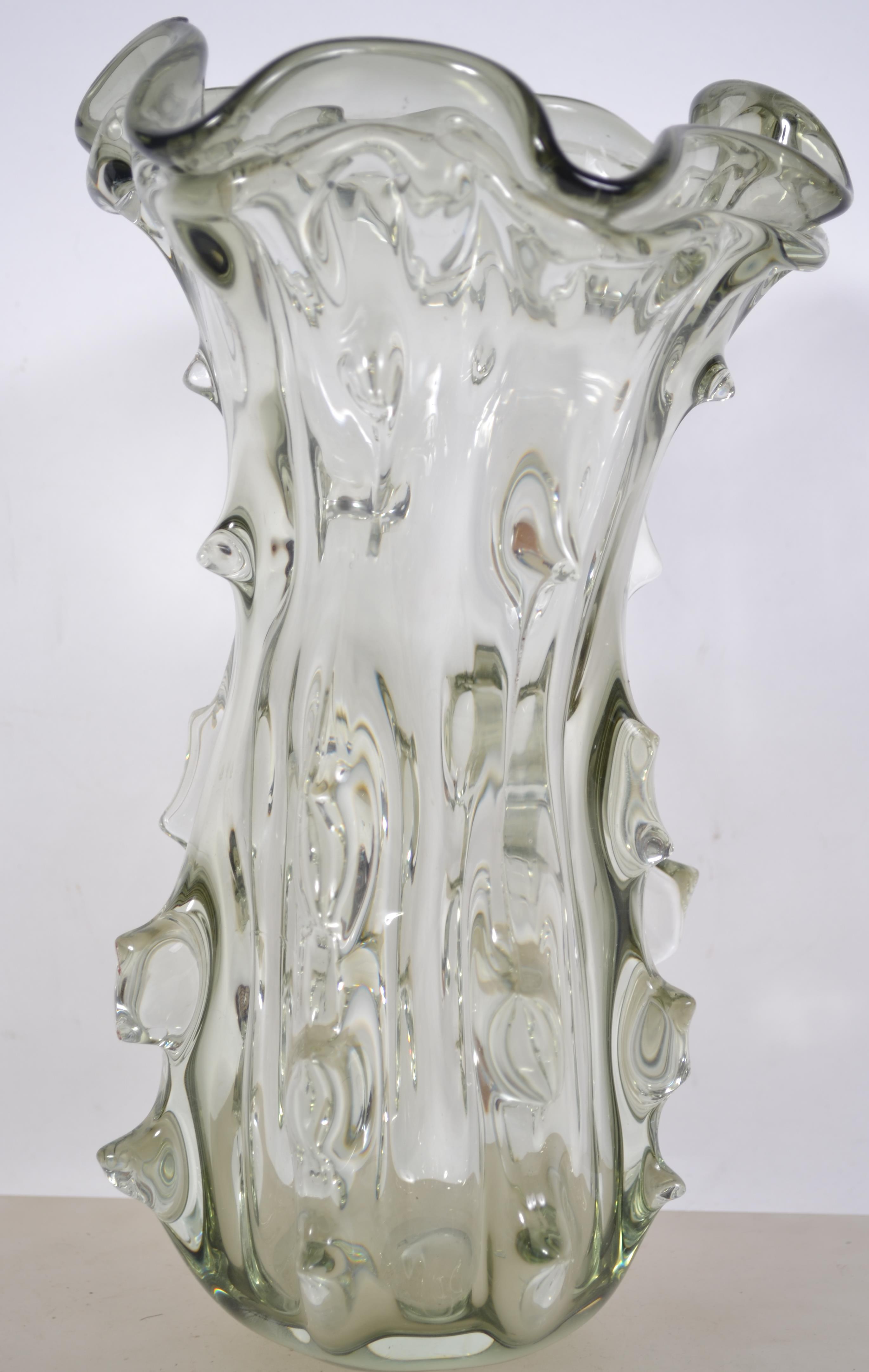 A mid 20th century large studio art glass vase of bark - knobbly form in the manner of Whitefriars