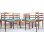 A set of 6 1960's McIntosh of Kirkcaldy teak and teal blue vinyl dining chairs. Raised on tapered