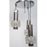 A retro 20th century chrome three point ceiling light fixture having a large circular chrome ceiling