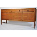 A retro 1970's Nathan teak sideboard raised on squared supports having a series of qtr panelled