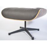 After Charles & Ray Eames. A Herman Miller  671 Ottoman raised on polished quadruped swivel base