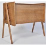 A 1960's Danish mid century teak chest / cabinet on stand in the manner of Robin Day for Hille /