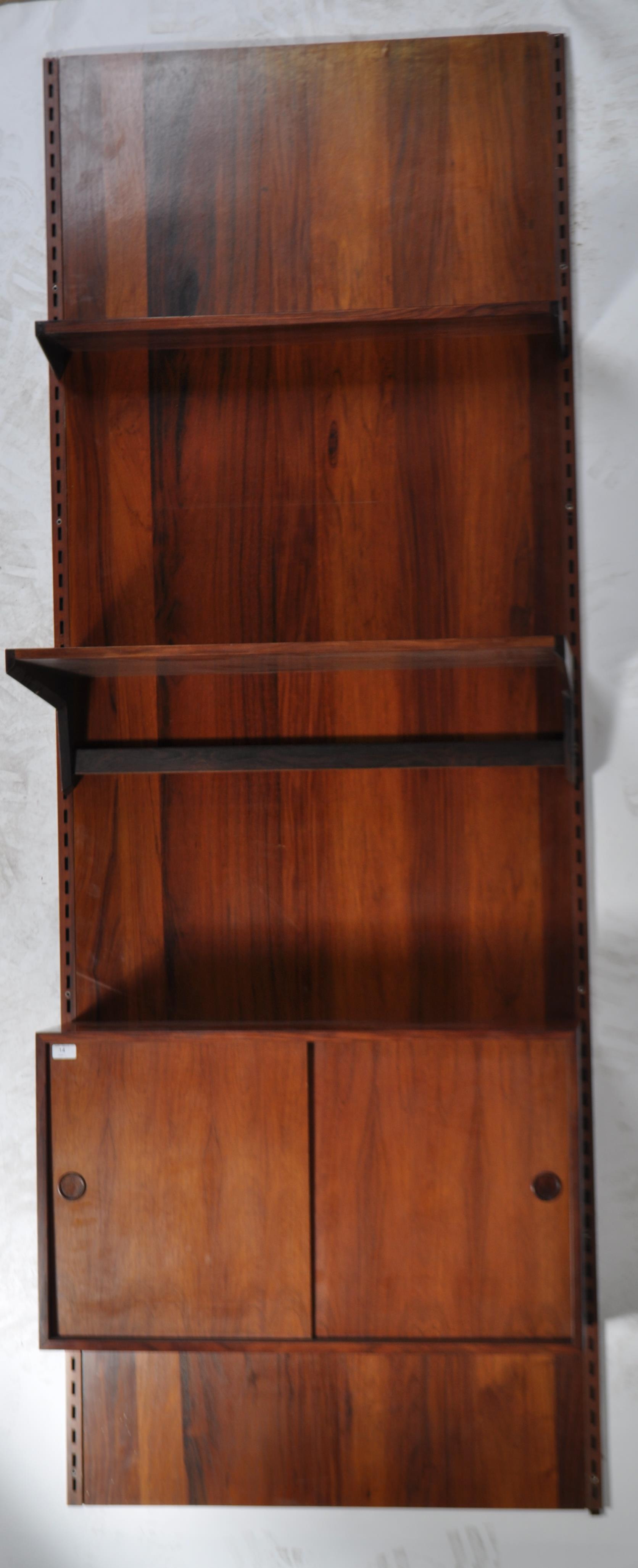 A rare mid century Danish rosewood modular wall system having a large rosewood panel back with - Image 3 of 10