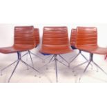 A set of 6 good brown leather and chrome swivel dining chairs. Raised on quadruped raised feet