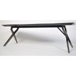 A 20th century modernist 'longjohn ' coffee - occasional table with polished mirror'd metal