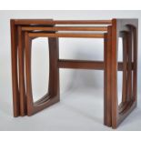 A G-Plan retro teak wood 1970's graduating nest of tables in the Quadrille pattern. The tables