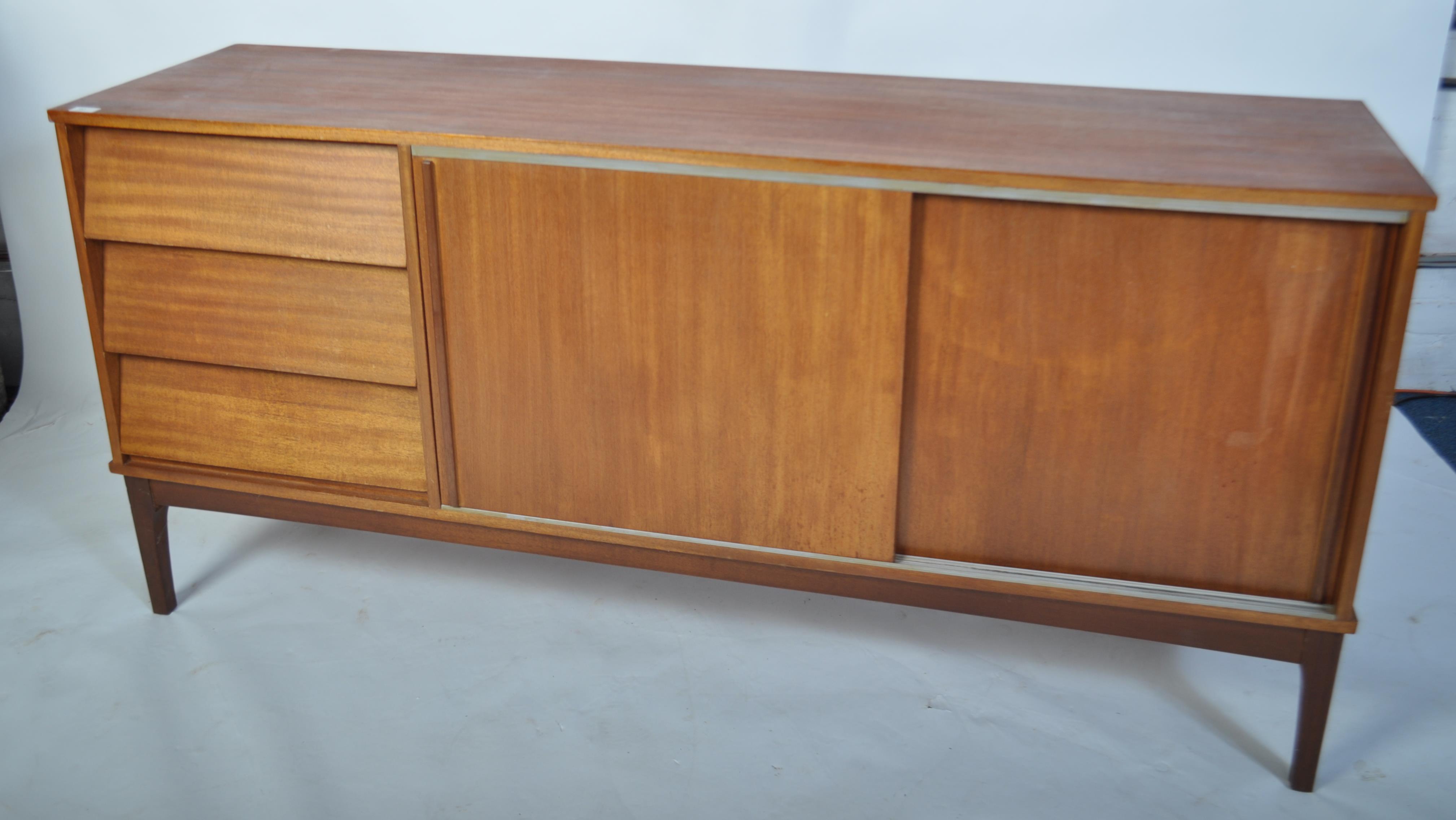 A retro mid century teak wood sideboard having a beehive angular facia comprising a series of - Image 2 of 5