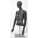 A high quality Italian made mannequin bust with removable adjustable arms and adjustable hands.