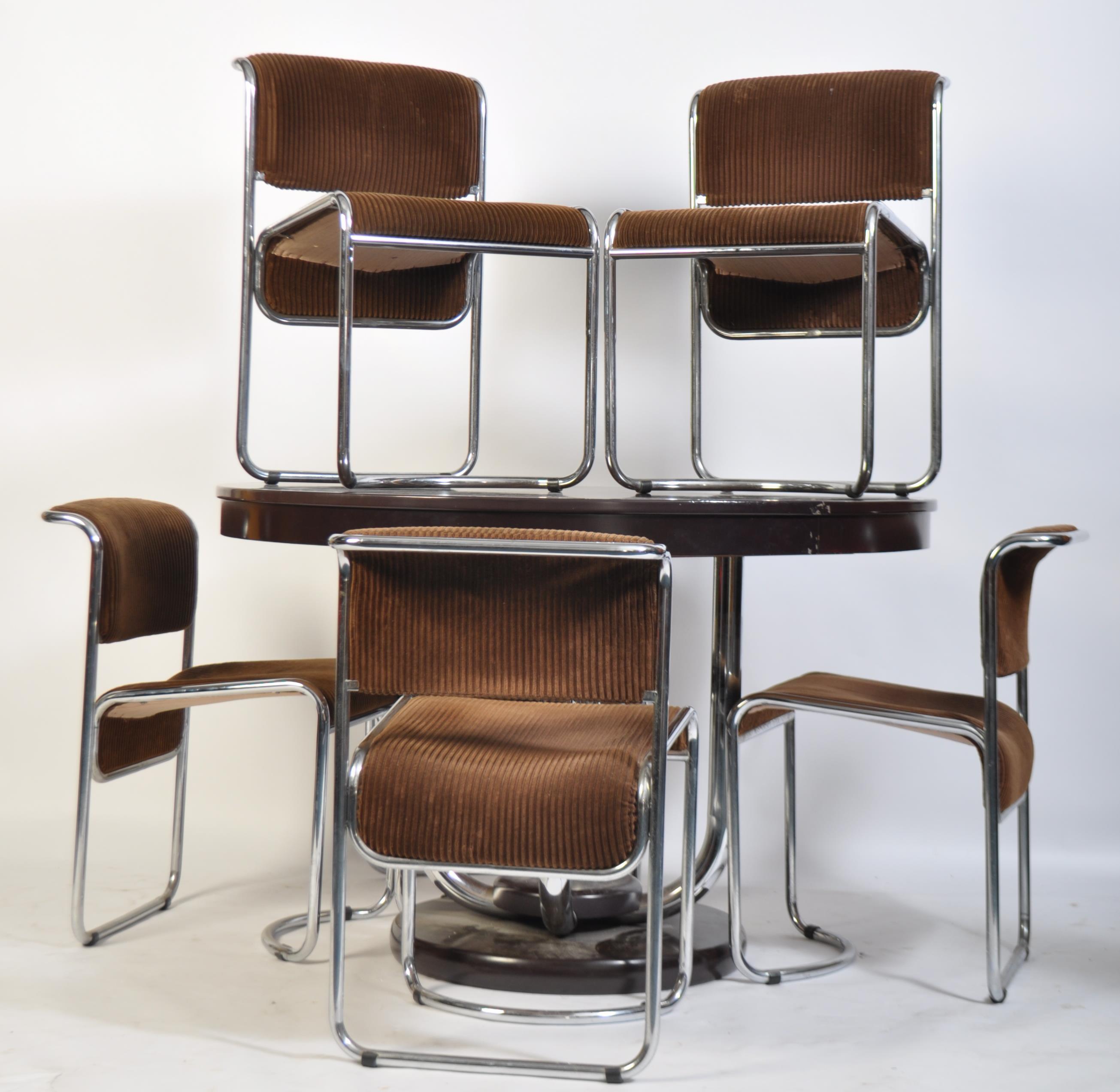 A superb mid century Italian faux rosewood and chrome pedestal circular dining table together with