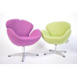 After Arne Jacobsen for Fritz Hansen, a pair of multi-couloured childrens Swan chairs - armchairs.